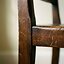 Beautifully aged walnut wood joint showing decades of use